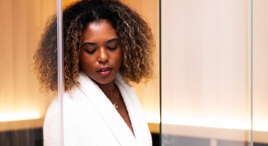 Woman in a sauna